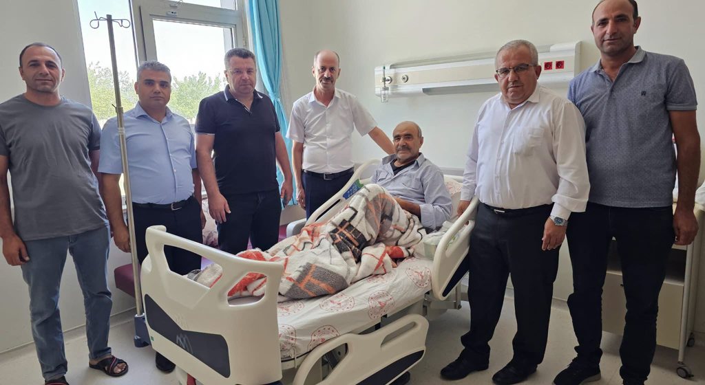 Bozova Mehmet Enver Yıldırım Devlet Hastanesinde Tedavi Gören Aziz Şehidimizin Kıymetli Babası Salih TAŞ’ı Ziyaret Ettik